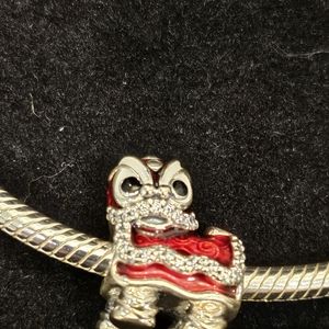 Pandora snake closure bracelet with Singapore dragon charm